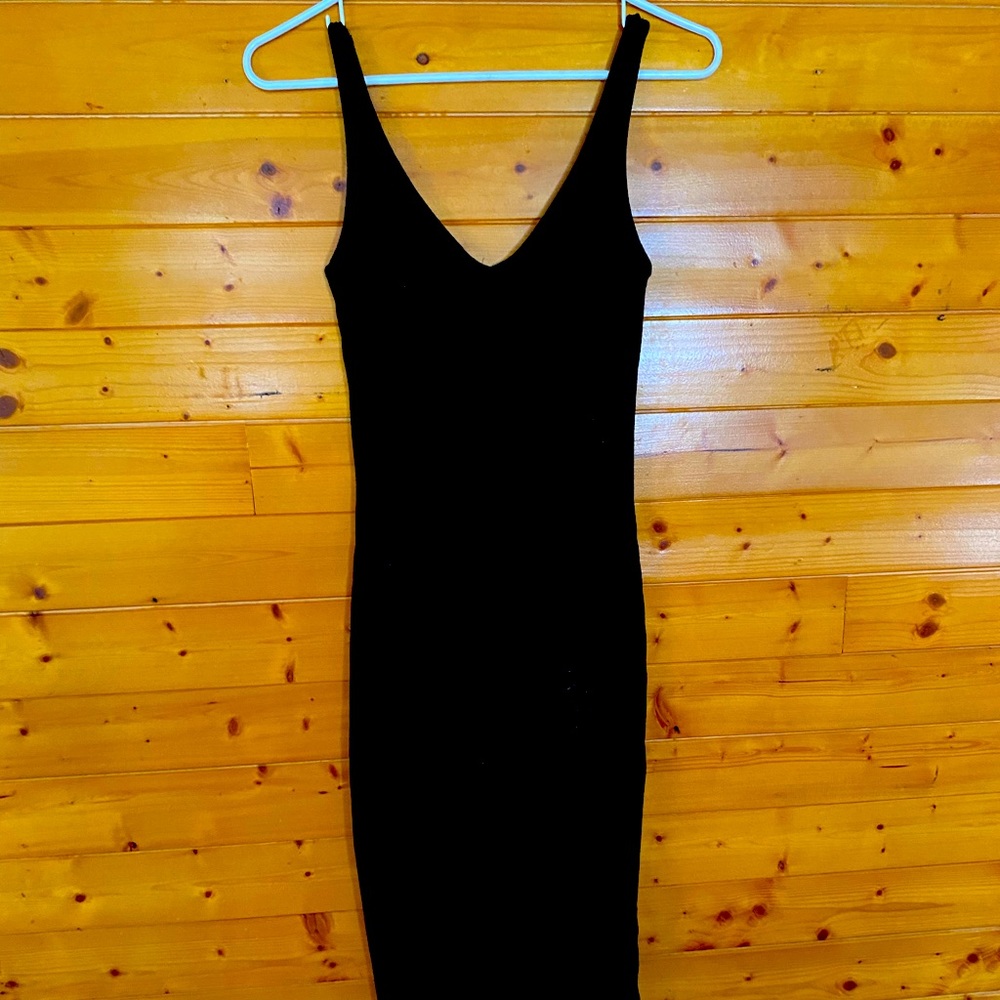 Fitting black dress, size small. Barely worn.